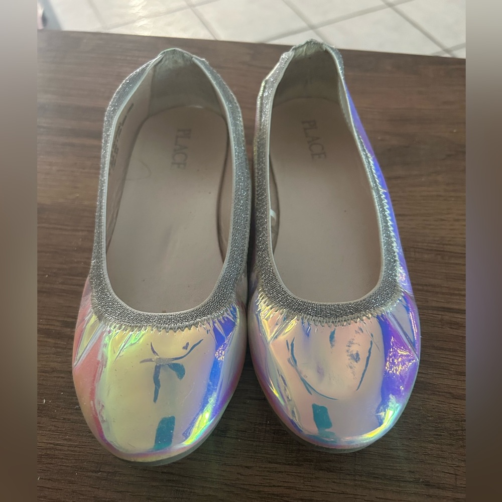 Metallic shiny ballet type flats.